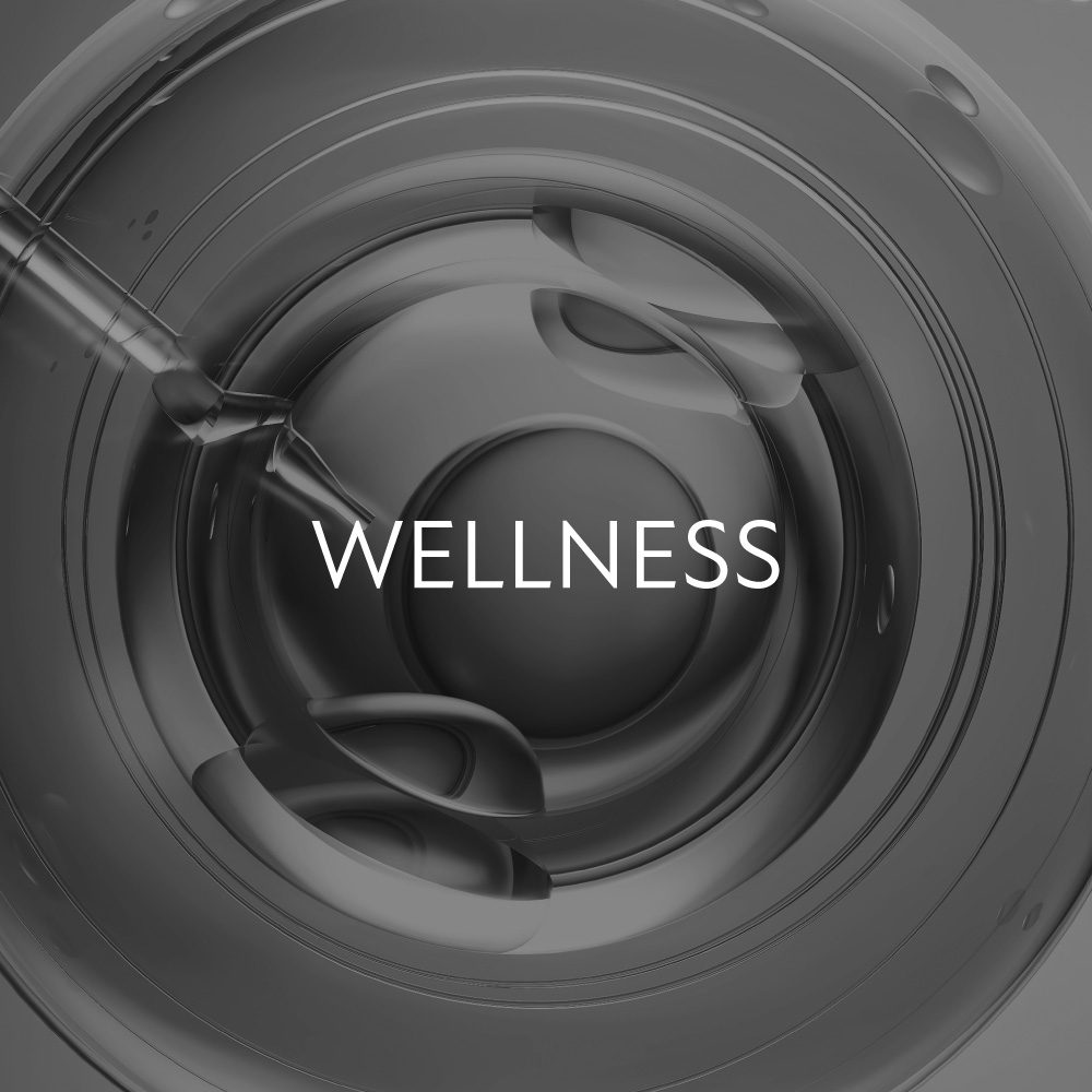 주사기와 원형 장비가 있는 이미지, 'WELLNESS' 문구